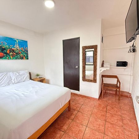 Hotel Casa Caracol Isla Mujeres Bagian luar foto